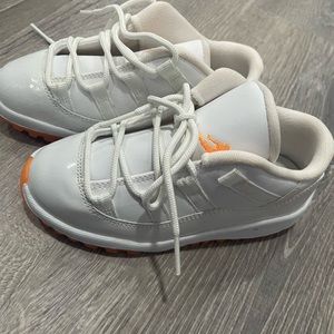 orange and white Jordan’s